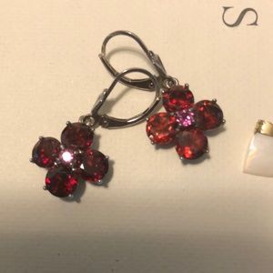 Mozambique garnet cross earrings on silver backing